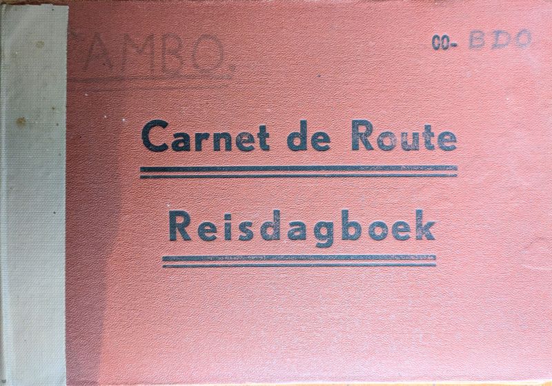 Picture of log book cover showing black text on red background